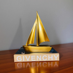 Golden Sailboat Sculpture
